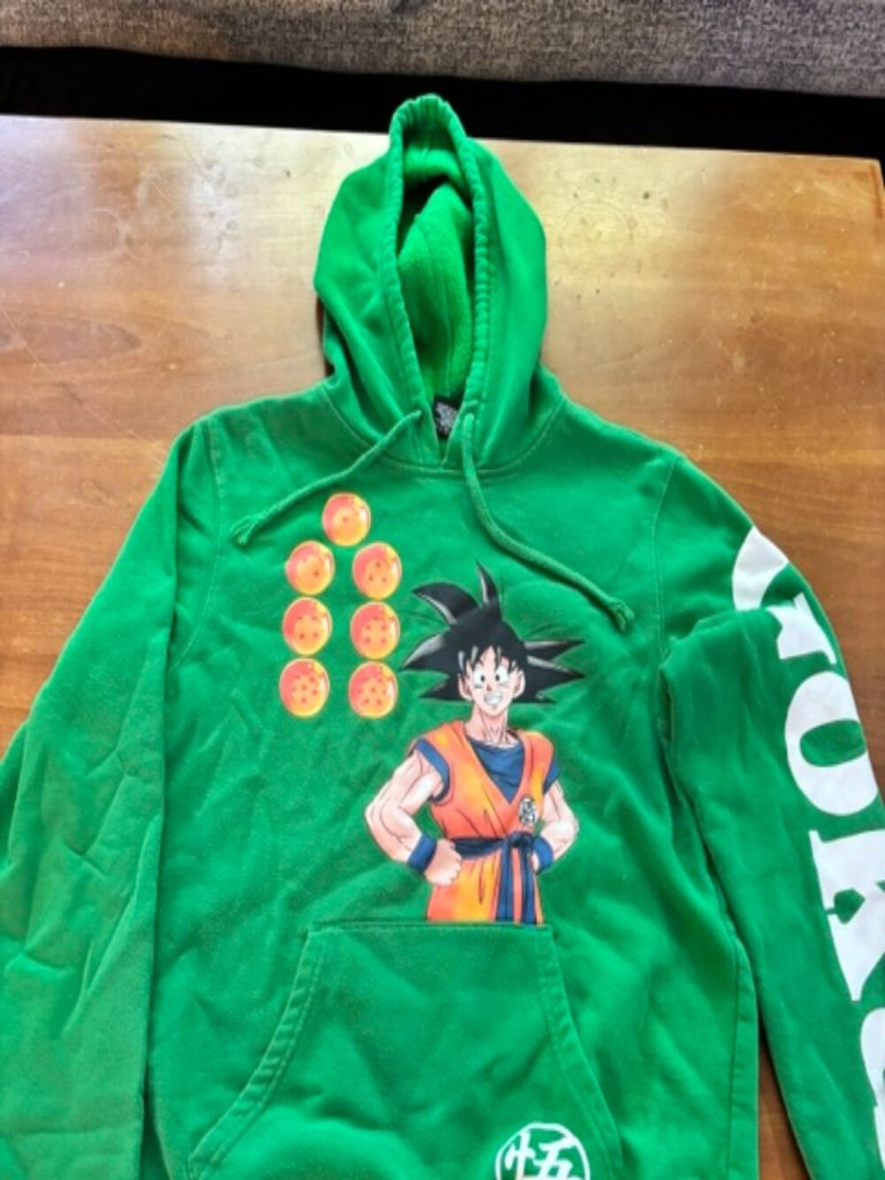 Unisex S Goku Dragonball Z Boxed Lunch Green hooded sweatshirt.